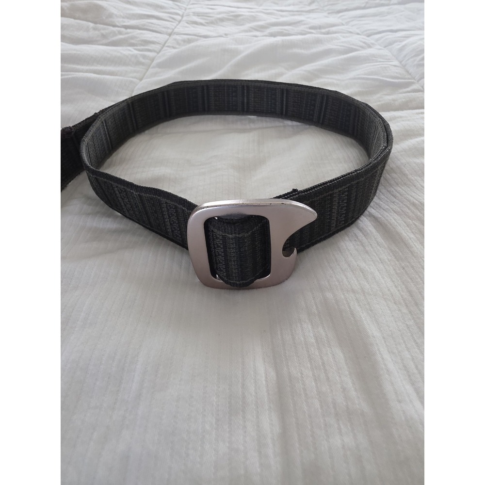 Bison Designs Tap Cap 38 mm belt featuring a gunmetal-colored bottle opener